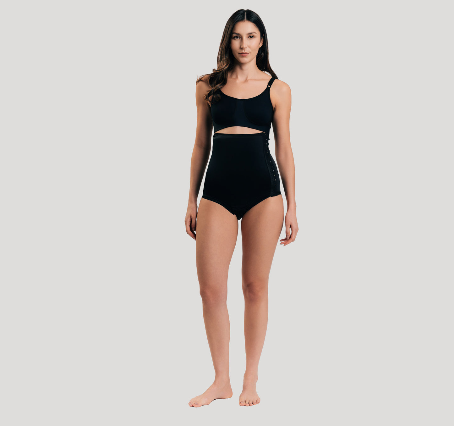 Side fastening girdle with removable insert