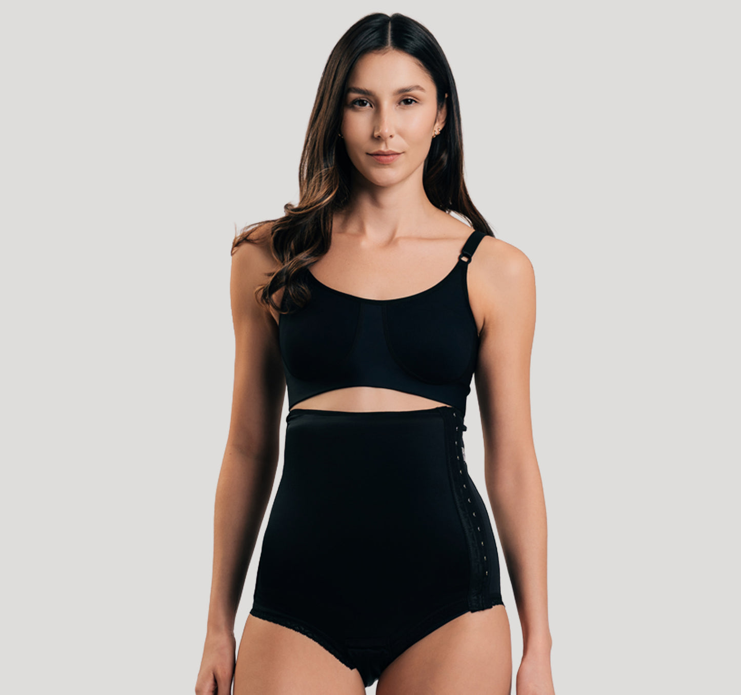 Side fastening girdle with removable insert