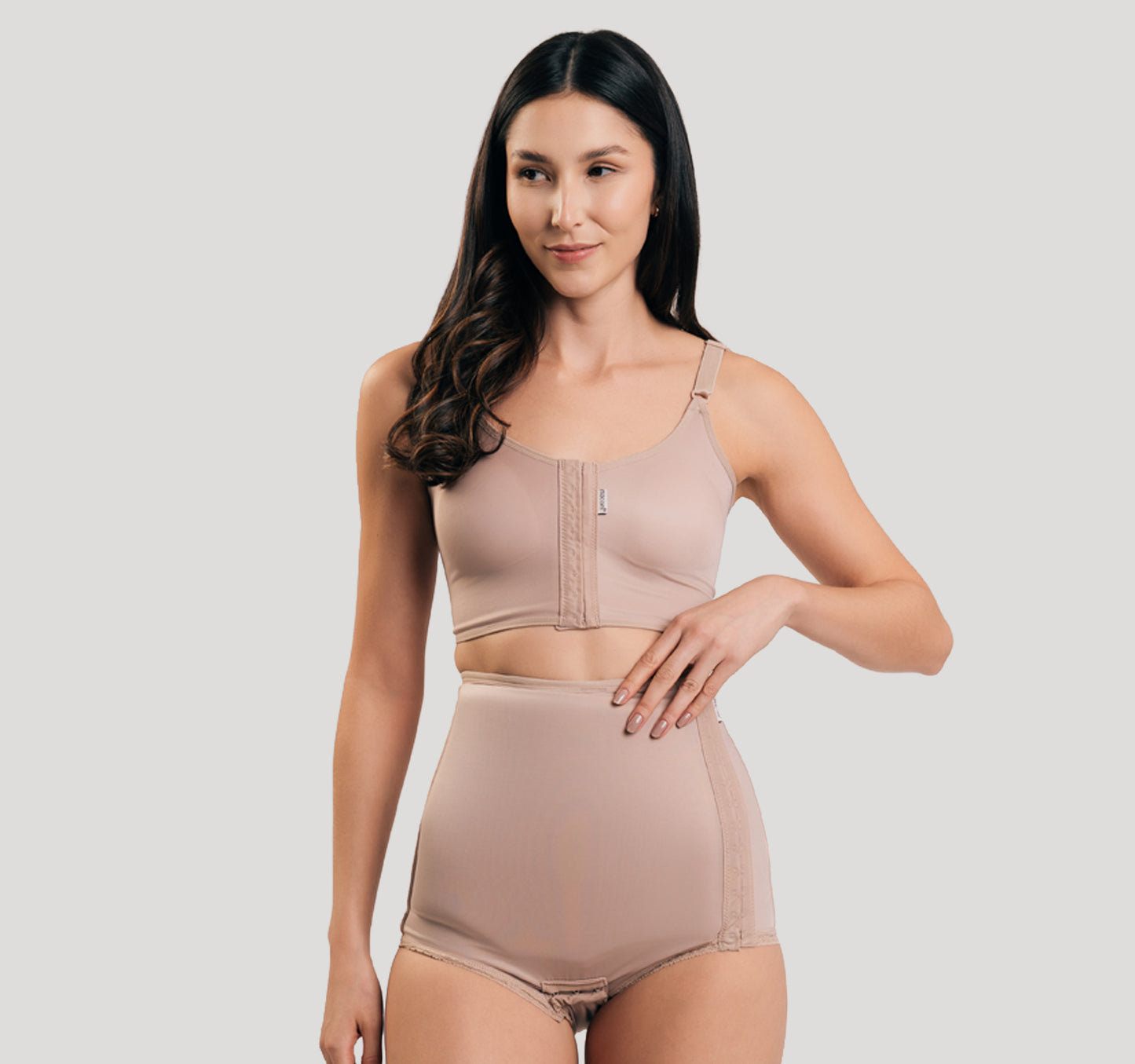 Side fastening girdle with removable insert
