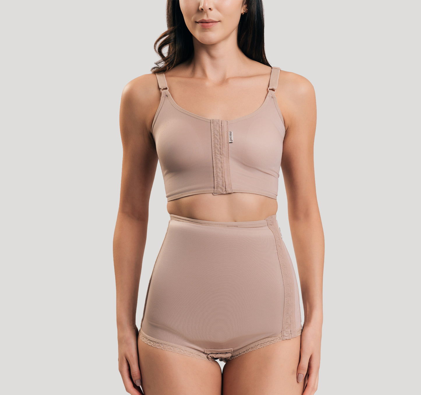 Side fastening girdle with removable insert