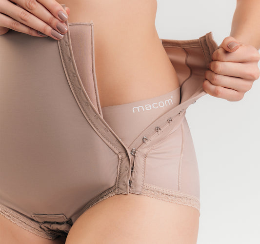 Side fastening girdle with removable insert