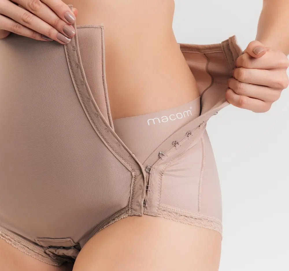 Side fastening girdle with removable insert