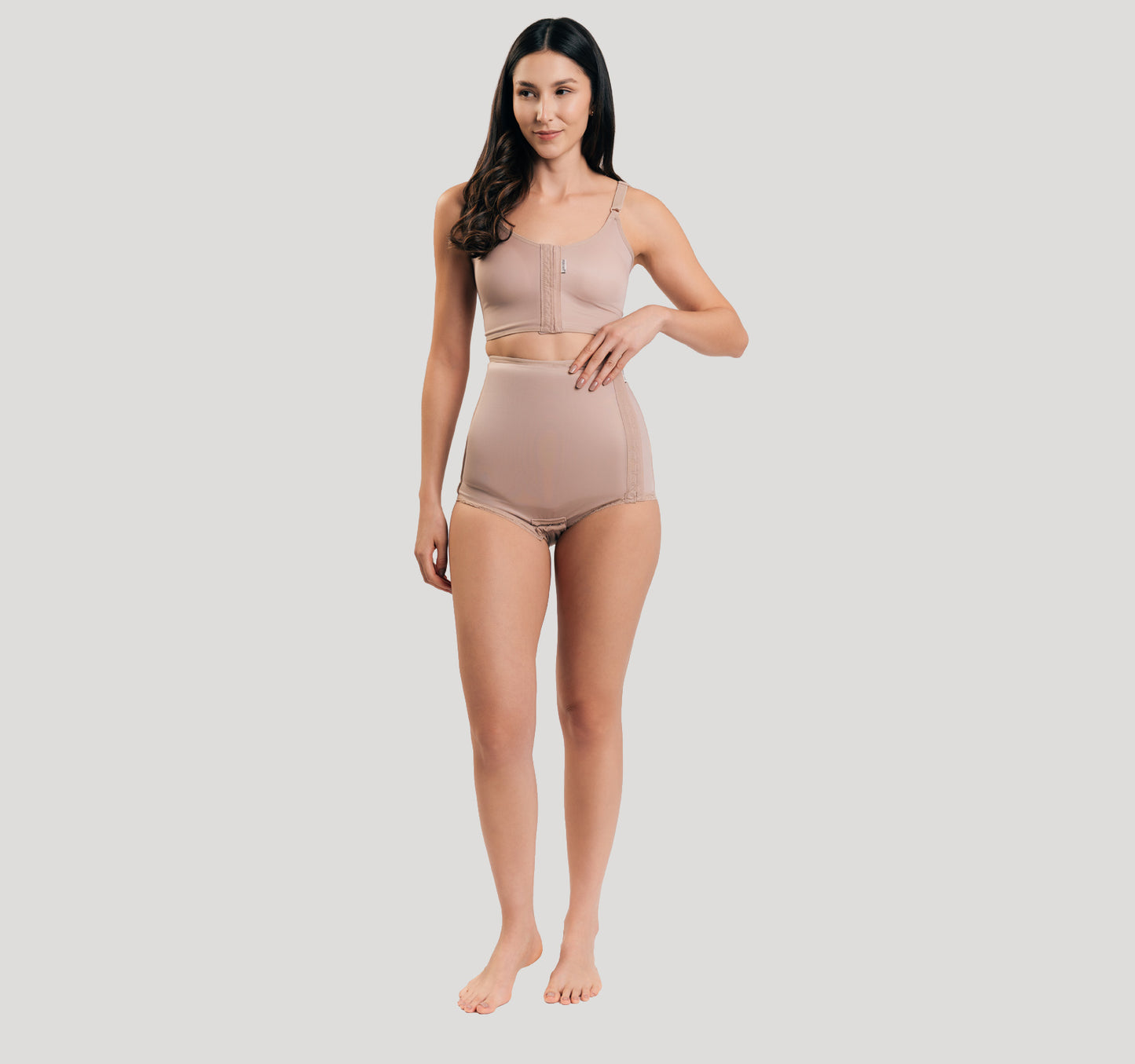 Side fastening girdle with removable insert