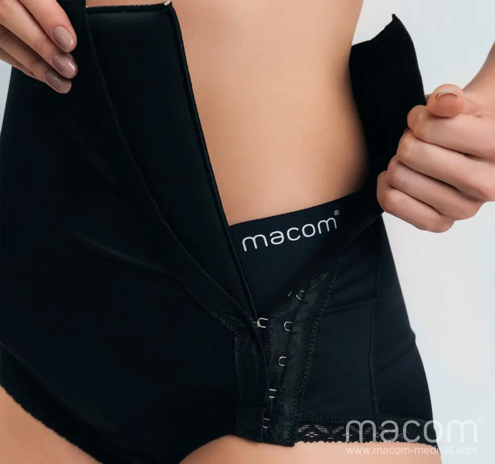Side fastening girdle with removable insert