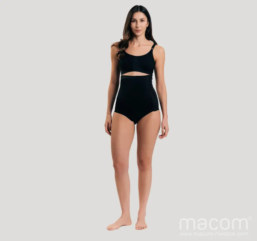 Side fastening girdle with removable insert